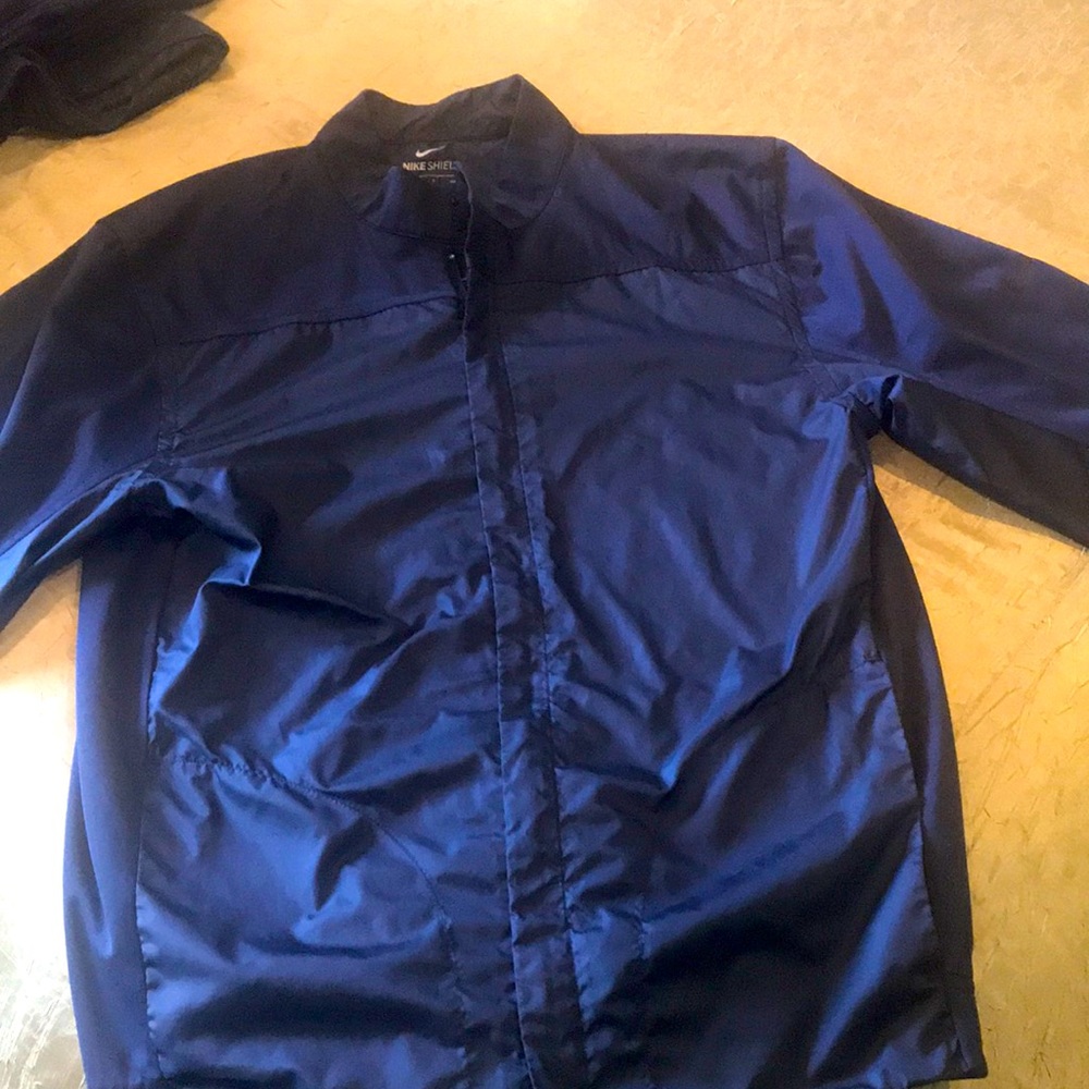 Nike shield jacket.  Small.  Navy blue.  Perfect condition. Windbreaker